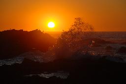 Solnedgång vid Asilomar beach i Monterey.